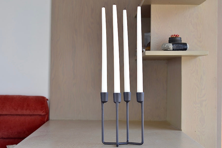 Normann Copenhagen Heima Cast Iron Candle Holder with four (4) arms.