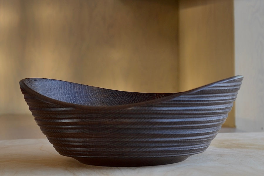 
            
                Load image into Gallery viewer, Circle Factory Brown Bowl in Black Oak with ridged detail. Made and designed by George Peterson. 
            
        