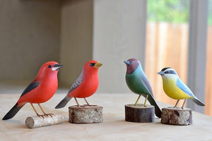Four wooden an colorful birds from Brazil. Fair trade and handmade.