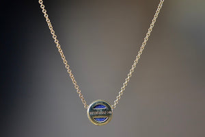 
            
                Load image into Gallery viewer, Mini Compass Pendant in Lapis by Retrouvai. Back view.
            
        