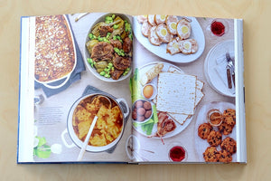
            
                Load image into Gallery viewer, Holiday spread from Cooking alla Giudia: A Celebration of the Jewish Food of Italy by Benedetta Jasmine Guetta.
            
        