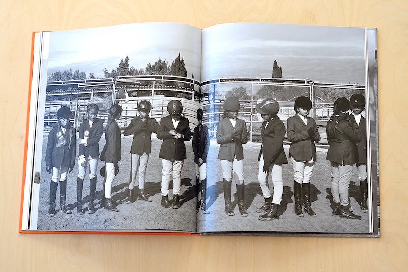 Riding Through Compton is a  Monograph depicting youth program teaching how to ride horses and responsibility. Grace, joy exudes from photographs.