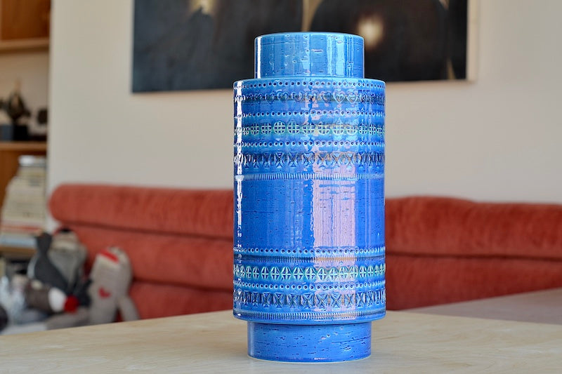 
            
                Load image into Gallery viewer, Rimini Blu Plinth vase is Current production of the &amp;quot;Rimini Blu&amp;quot; series. Designed between 1955 and 1965 by by Aldo Londi. This vase is hand made in Italy and one of a kind, made in ceramic earthenware and with a blue glaze and 13&amp;quot; tall..
            
        