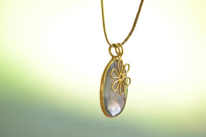 Colette Pendant in Labradorite with gold flower.