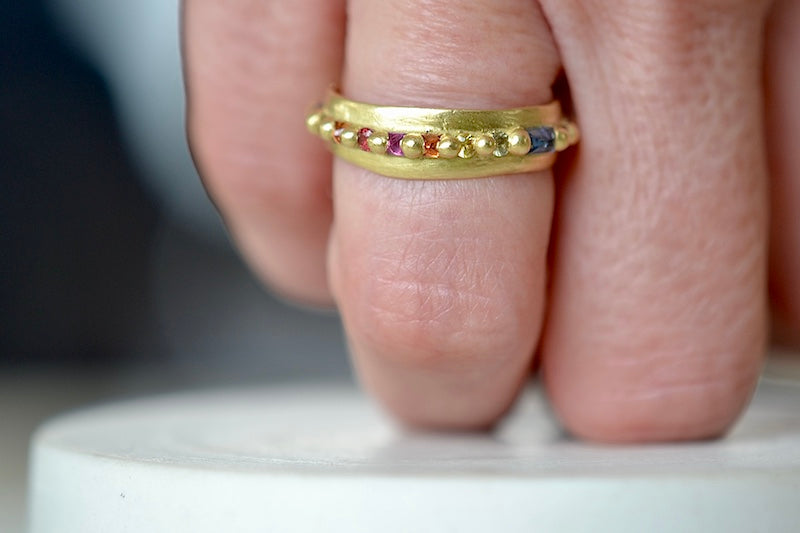 
            
                Load image into Gallery viewer, Wearing the Wide Harlequin Nina Pinch Ring by Polly Wales.
            
        