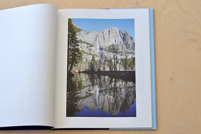 Yosemite by Catherine Opie is a slipcovered limited edition of 350  coffee table  book of photographs from Yosemite National park, in focus and out of blurred, capturing and breaking down its majestic nature from Nazraeli Press. 