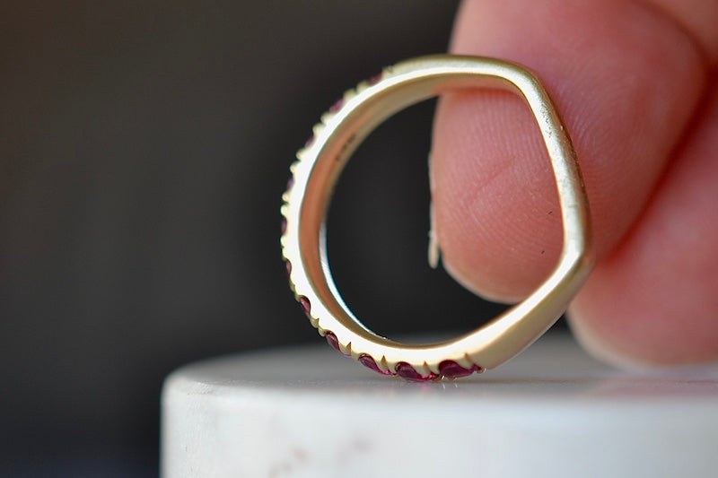 
            
                Load image into Gallery viewer, Side view of Euro Wedding band ring in ruby by Elizabeth street Jewelry.
            
        