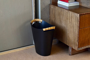 
            
                Load image into Gallery viewer, The Ørskov Wastebasket is made in matte black steel with cane wrapped handles and is 13&amp;quot; tall. It was designed by Grethe Kornerup-Bang in Denmark and is still  produced by Torben Orskow. Scale.
            
        