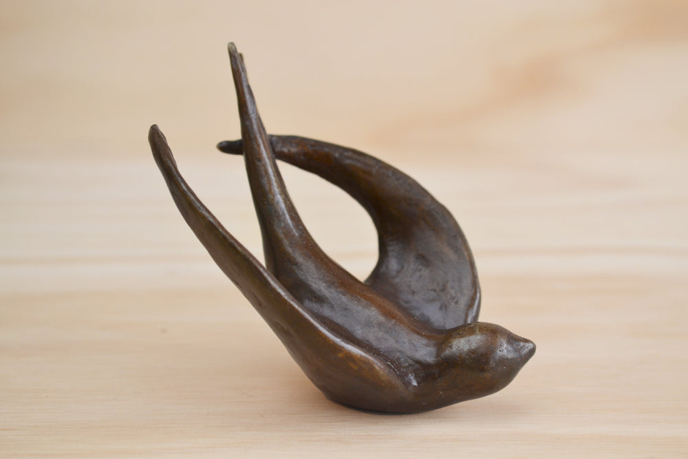 
            
                Load image into Gallery viewer, Bronze Object &amp;quot;Coming Home&amp;quot; (flying swallow) by Anne Ricketts.
            
        