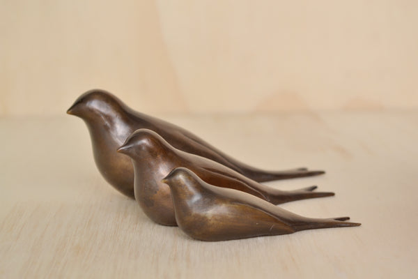 Bronze Objects "Swallows" by Anne Ricketts in three sizes.