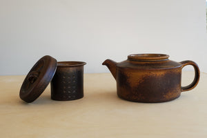 
            
                Load image into Gallery viewer, Vintage Arabia Finland &amp;quot;Ruska&amp;quot; Teapot is a vintage teapot in  brown matte glaze with lid and large infuser in excellent shape.  Designed for Arabia by Ulla Procopé in Finland. 
            
        