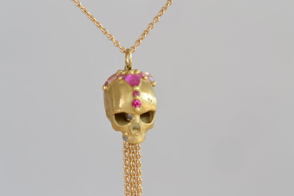 
            
                Load image into Gallery viewer, Polly Wales Forbidden Skull Necklace 18k yellow recycled gold pink fuchsia sapphires long chain necklace pendant enchanted.
            
        