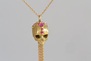 
            
                Load image into Gallery viewer, Polly Wales Forbidden Skull Necklace 18k yellow recycled gold pink fuchsia sapphires long chain necklace pendant enchanted.
            
        