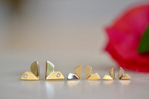 Origami stud earrings by Kaylin Hertel.