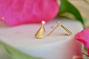 Kaylin Hertel light Ray stud earrings with white Canadian diamond accents in 14k yellow gold and satin finish.