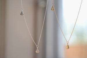 
            
                Load image into Gallery viewer, Chime necklaces in Silver and Gold by kaylin Hertel.
            
        