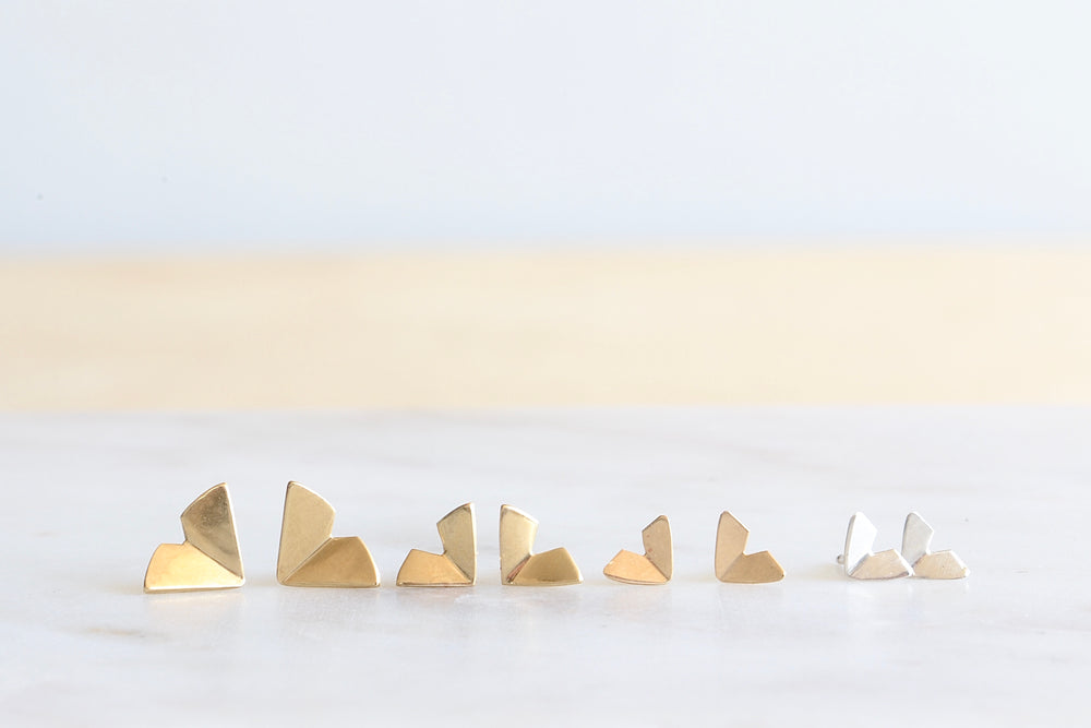 Kaylin Hertel Origami stud Studs Earrings in 14k yellow gold or sterling silver are Perfectly minimal gold origami bird studs in small, medium or large.