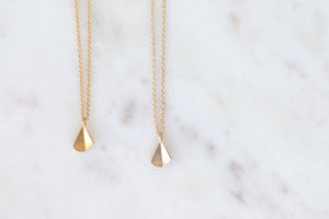 Flicker Pendant Necklace by Kaylin Hertel in Gold and Silver.