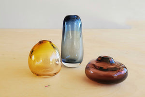 Dimple Vases in tall blue, medium amber and short tea are Very small handblown vases by Portland, OR artist Matthew Abadi