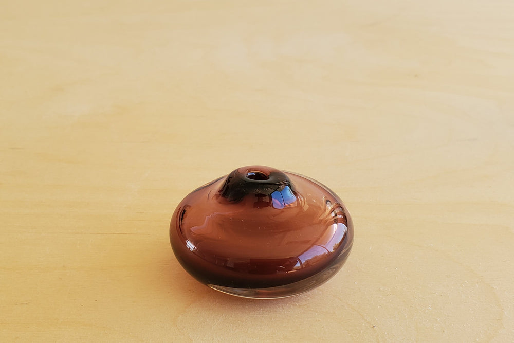 
            
                Load image into Gallery viewer, Dimple Vase in short tea is a very small handblown vases by Portland, OR artist Matthew Abadi.
            
        