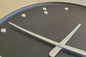 Close up of Finn Juhl Stained Ash Clock.