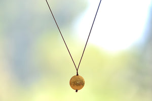 
            
                Load image into Gallery viewer, Margaret Solow 20k Gold Hammered Disc Pendant Necklace Nylon Cord
            
        