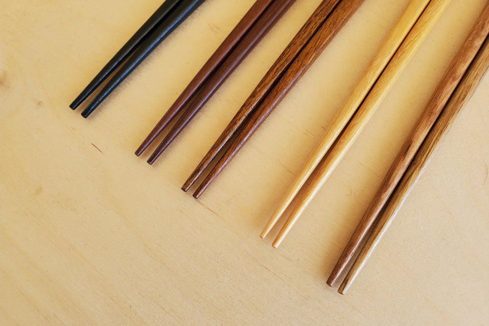 Japanese Style Chopsticks each in different type of wood. Set of five.