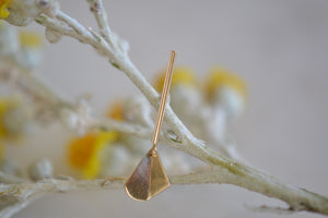 
            
                Load image into Gallery viewer, Kaylin Hertel 14k yellow gold flicker stud is a bent leaf on bar with post closure sold as single earring stud.
            
        