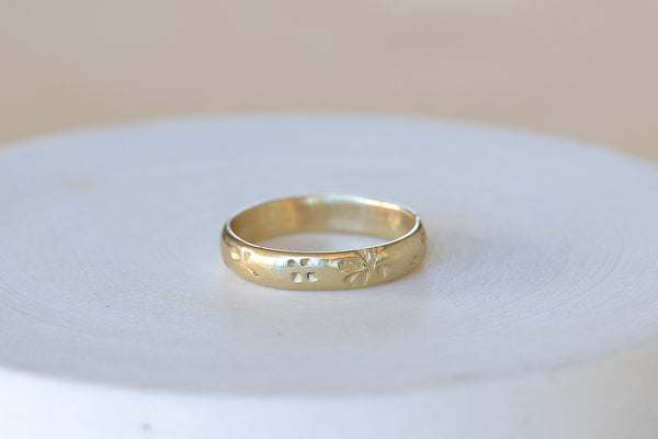 Slim Petal Print band in 14k yellow gold by Kaylin Hertel.