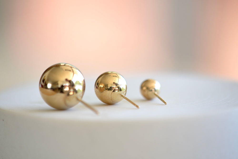 
            
                Load image into Gallery viewer, Kathleen Whitaker Sphere Stud Earring s small, medium, large 14k yellow gold hollow round
            
        
