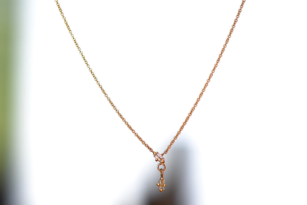
            
                Load image into Gallery viewer, Lizzie Mandler Shift White Diamond Baguette Necklace in 18k yellow gold.
            
        