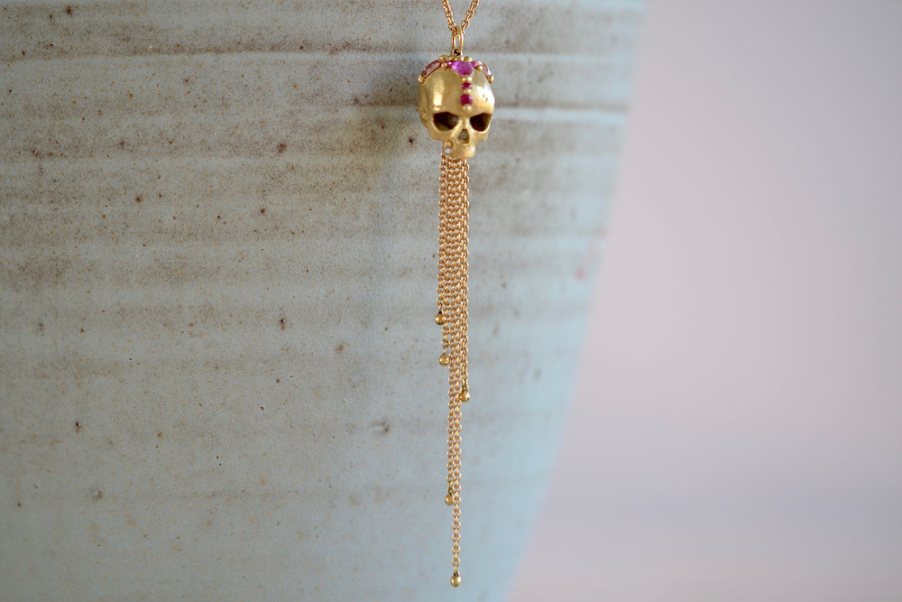 Polly Wales Forbidden Skull Necklace 18k yellow recycled gold pink fuchsia sapphires long chain necklace pendant