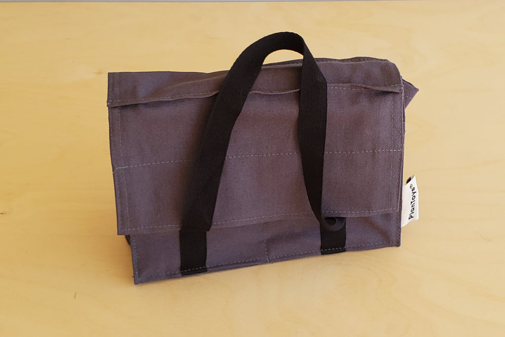 Detective kit set from Plan Toy with glasses, walkie talkie, camera, bag and accessories.