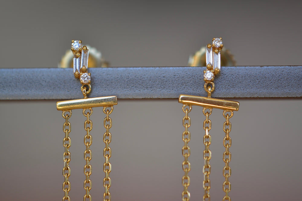 
            
                Load image into Gallery viewer, Three Strand Dangle Fringe Earrings by Suzanne Kaman in 18k yellow gold with diamonds round and baguettes and super long..
            
        