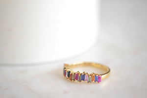 
            
                Load image into Gallery viewer, Suzanne Kalan Rainbow Sapphire Half Eternity Band vertical baguette sapphires 18k yellow gold
            
        