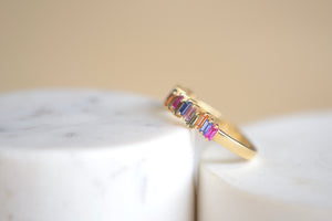 
            
                Load image into Gallery viewer, Suzanne Kalan Rainbow Sapphire Half Eternity Band vertical baguette sapphires 18k yellow gold
            
        