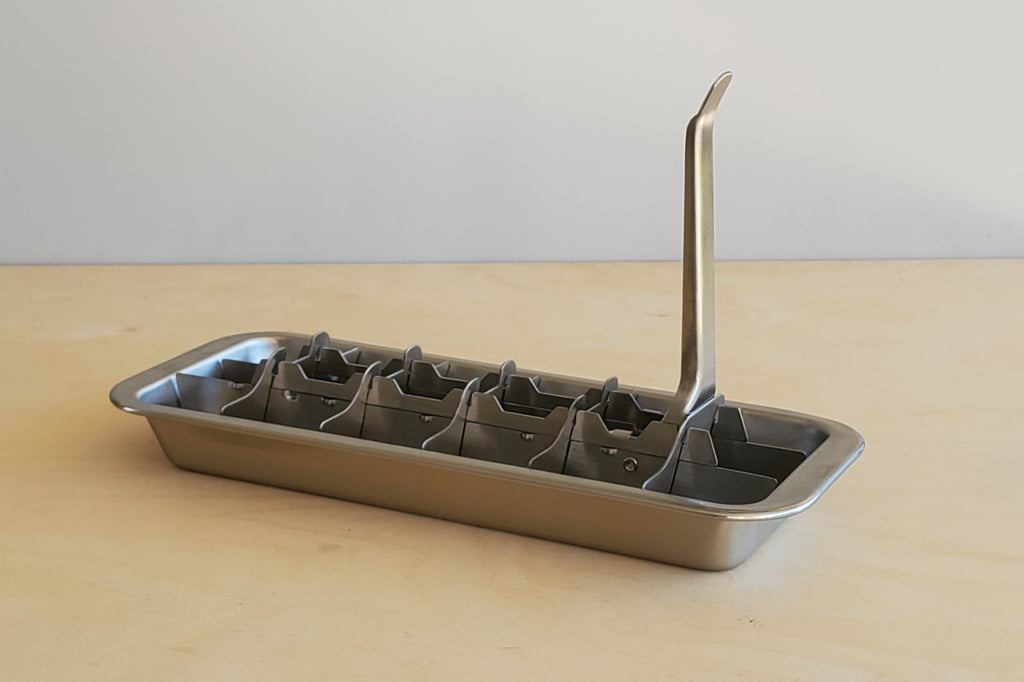 Classic Stainless Steel Ice Cube Tray with removable top.