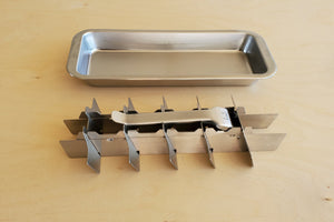 Classic Stainless Steel Ice Cube Tray with removable top.