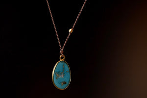
            
                Load image into Gallery viewer, Sleeping Beauty Turquoise Pendant Necklace from the back by Margaret Solow.
            
        