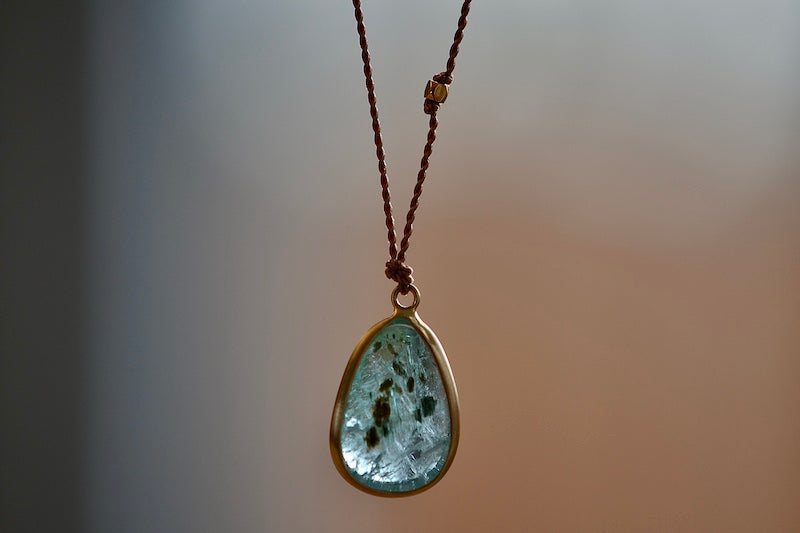 Back of Emerald Pendant Necklace with Inclusions by Margaret Solow.