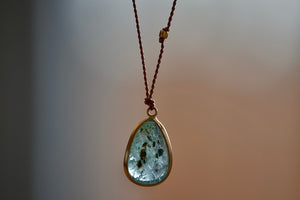 Back of Emerald Pendant Necklace with Inclusions by Margaret Solow.