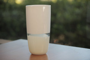 
            
                Load image into Gallery viewer, Lattimo White &amp;amp; Ivory Flat Cylinder Vase Small designed by Caleb Siemon &amp;amp; Salazar.
            
        