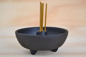 
            
                Load image into Gallery viewer, Japanese Cast Iron round Incense Burner with four sticks of incense.
            
        